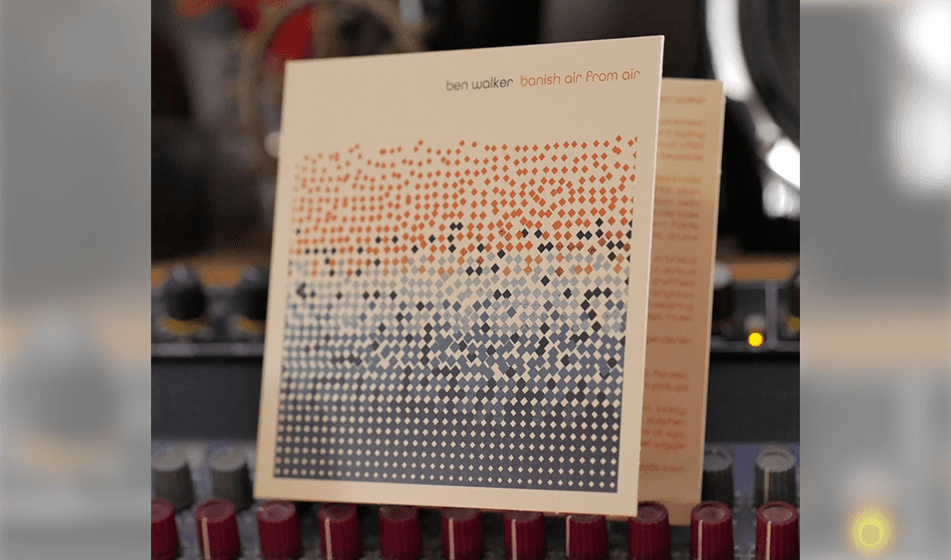 Image of the CD for the album "Banish Air From Air", resting against some audio equipment